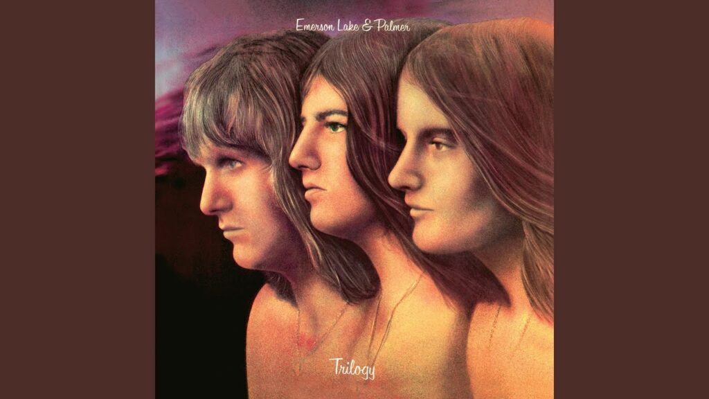 Le trio Emerson Lake and Palmer sur scène, claviers, basse et batterie